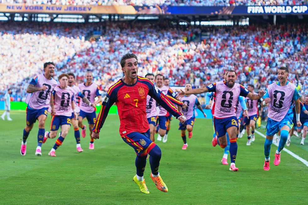 Spain's Ferran Torres (7) celebrates scoring their first goal during the World Cup final...