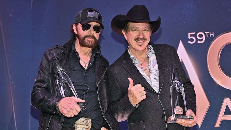 Ronnie Dunn, left, and Kix Brooks of Brooks & Dunn, winners of the award for vocal duo of the...