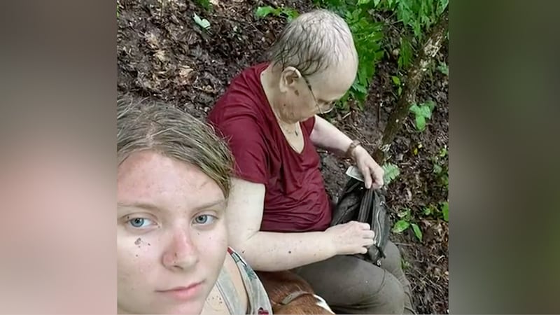 A Kansas woman said she spent 16 hours on a hill with her grandmother to escape rising...