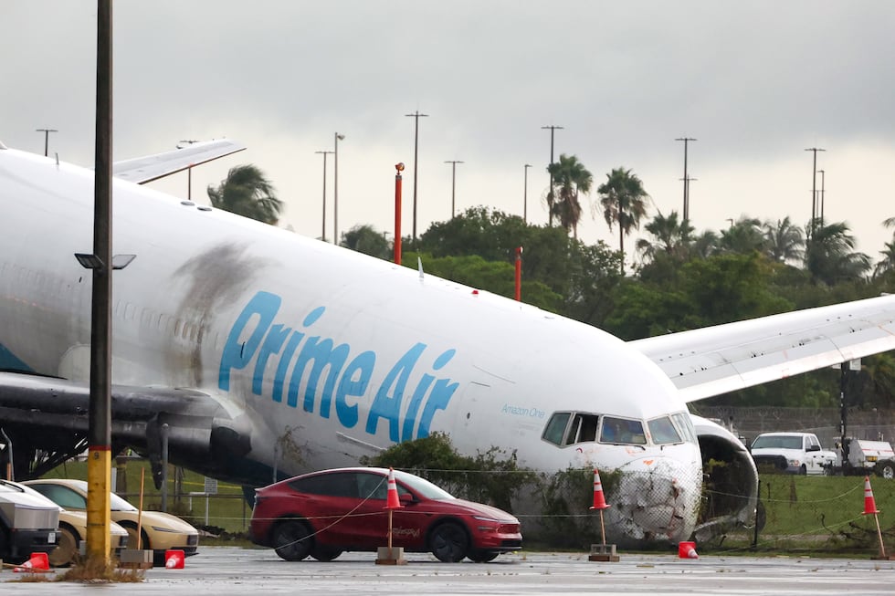 An Amazon cargo plane sits at Miami International Airport after overshooting a runway on...