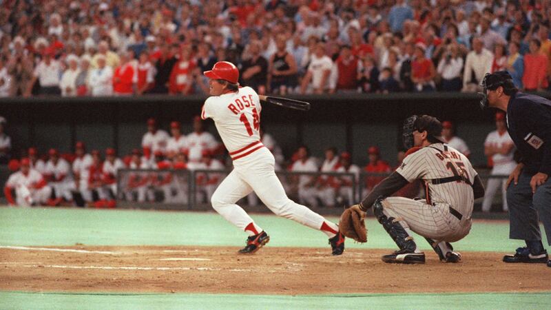 FILE - In this Sept. 11, 1985 file photo, Cincinnati Reds baseball player Pete Rose hits a...