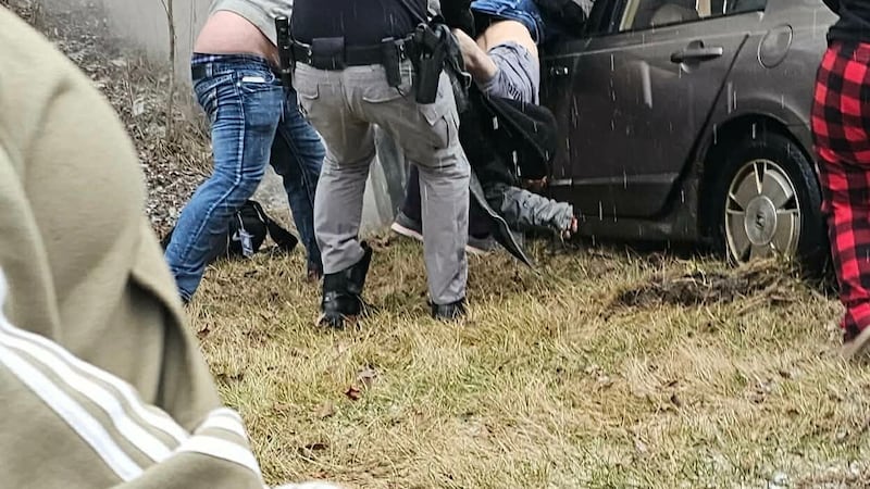 Kenton County officer, civilians rescue man from burning car after crash