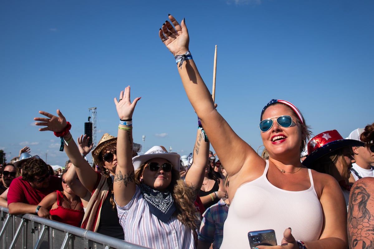Fans enjoying Cooper Alan's set at Voices of America Country Music Festival.