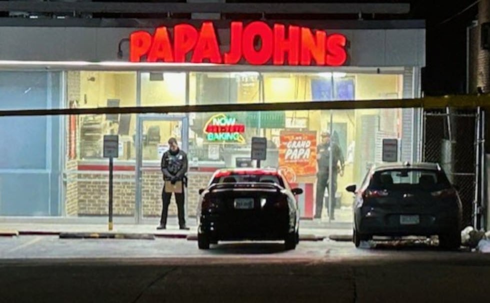 Man killed inside Papa Johns, employee charged with murder