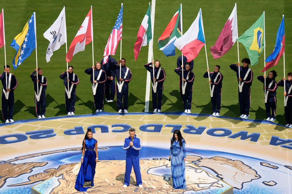 Robbie Williams sings before the World Cup final soccer match between Spain and Argentina in...
