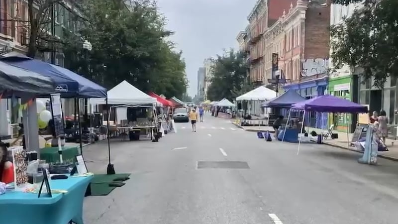 Vendors line the street at an event in OTR.